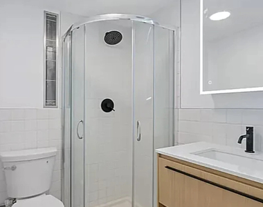 66 Devoe St - Photo Thumbnail 9