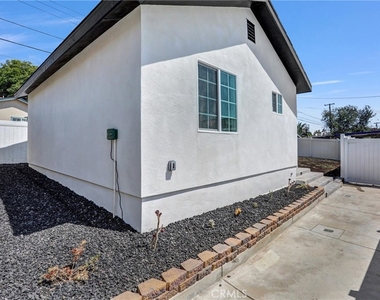 9983 Vernon Ave - Photo Thumbnail 2