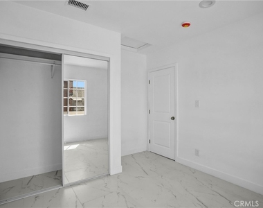 9983 Vernon Ave - Photo Thumbnail 12