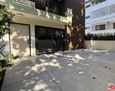 322 S Swall Drive - Photo Thumbnail 1