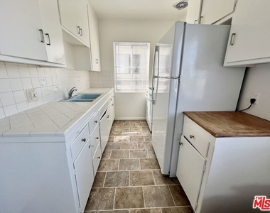 10303 Palms Boulevard - Photo Thumbnail 4