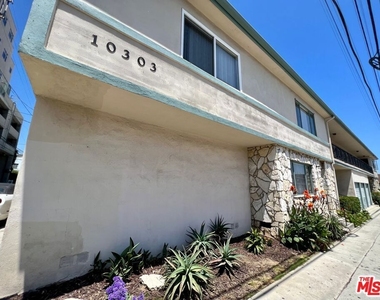 10303 Palms Boulevard - Photo Thumbnail 22