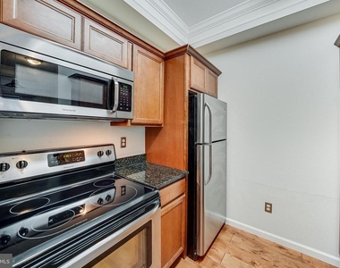 1550 Spring Gate Drive - Photo Thumbnail 3