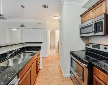 1550 Spring Gate Drive - Photo Thumbnail 4