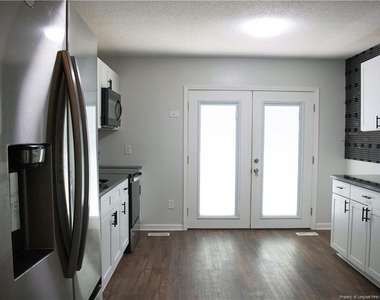5839 Rivercroft Road - Photo Thumbnail 3