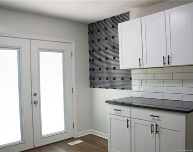 5839 Rivercroft Road - Photo Thumbnail 4