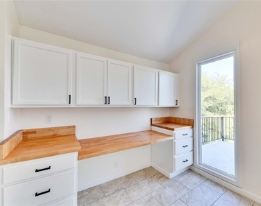 1903 Woodland Ave - Photo Thumbnail 5