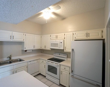 1307 Kinney Ave - Photo Thumbnail 4