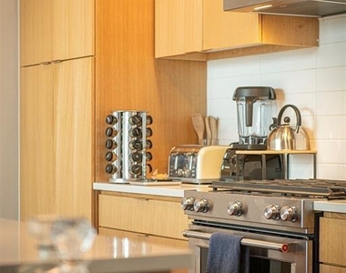 1322 E 12th St - Photo Thumbnail 2