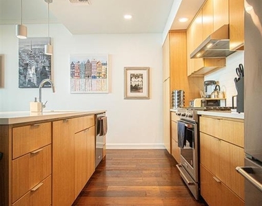 1322 E 12th St - Photo Thumbnail 1
