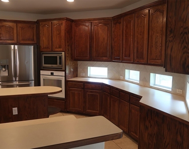 2915 Briona Wood Ln - Photo Thumbnail 2