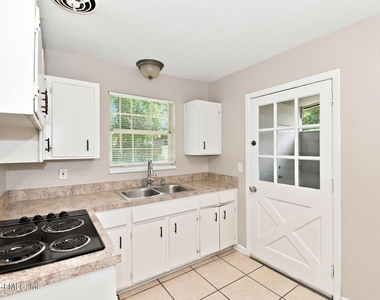 7001 Charbourg Avenue N - Photo Thumbnail 3