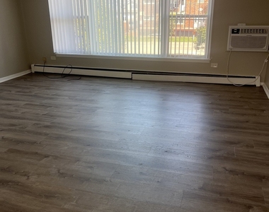 8701 S 81st Court - Photo Thumbnail 1