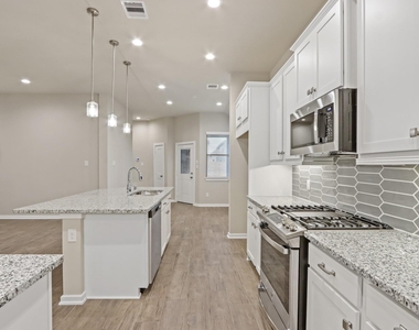 7011 Golden Groundsel Drive - Photo Thumbnail 7