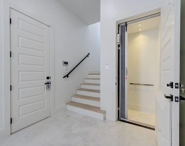 5702 Fairdale Ln - Photo Thumbnail 3