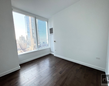 West 36 Street - Photo Thumbnail 2