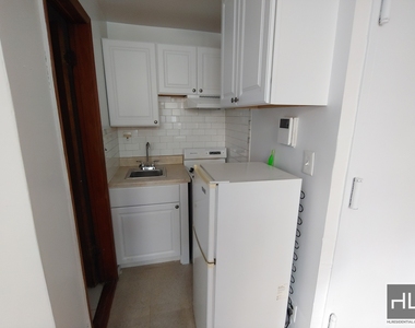 East 61 Street - Photo Thumbnail 1