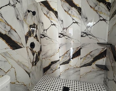 1304 E 32nd Avenue - Photo Thumbnail 3