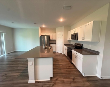 7909 Peacelily Avenue - Photo Thumbnail 5