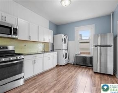 419 W West 4th Street - Photo Thumbnail 6