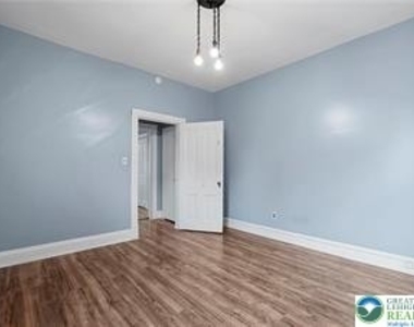 419 W West 4th Street - Photo Thumbnail 4