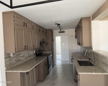 8104 Dempsey Avenue - Photo Thumbnail 5