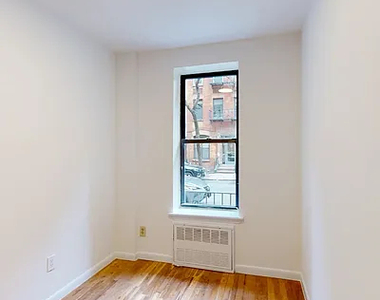 415 East 73rd Street - Photo Thumbnail 2