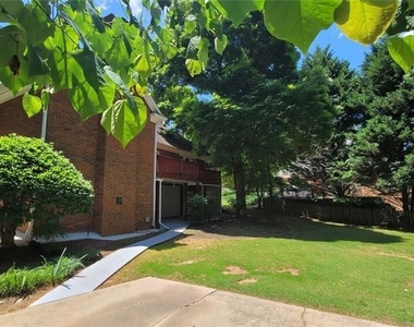 5005 Johns Creek Court - Photo Thumbnail 3