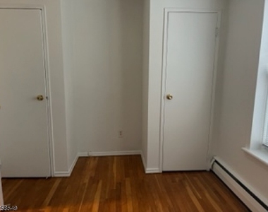 123 Milligan Pl - Photo Thumbnail 1