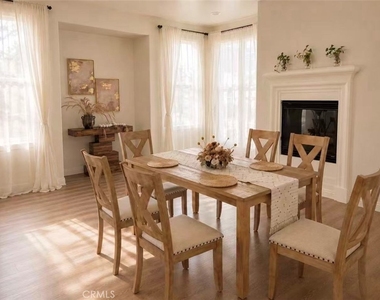 8062 Holland Park St - Photo Thumbnail 2