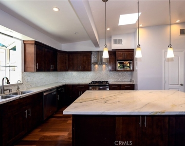 5754 Wish Avenue - Photo Thumbnail 1