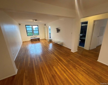 89-20 55th Avenue - Photo Thumbnail 1