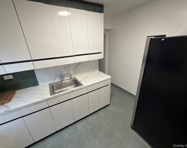 89-20 55th Avenue - Photo Thumbnail 14