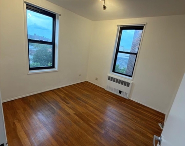 89-20 55th Avenue - Photo Thumbnail 2