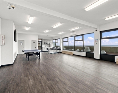 1 E Broadway - Photo Thumbnail 15