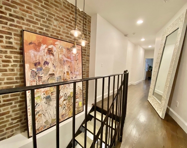 219 E 11th Street - Photo Thumbnail 6
