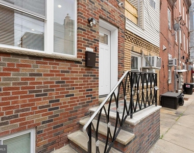 2445 S Rosewood Street - Photo Thumbnail 2