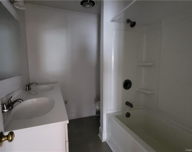 311 E 16th Street - Photo Thumbnail 4