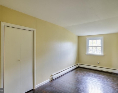 107 E Sixth Street - Photo Thumbnail 5