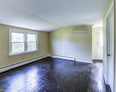 107 E Sixth Street - Photo Thumbnail 1