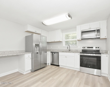 7719 Mccowan - Photo Thumbnail 4