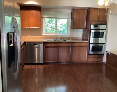 928 N Rohlwing Road - Photo Thumbnail 4