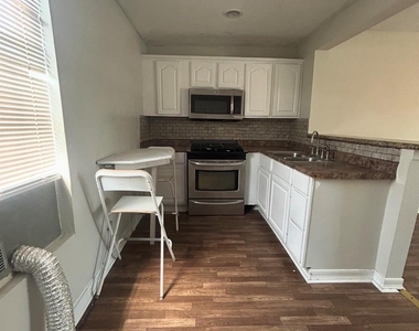 727 W 6th Unit 1 Street - Photo Thumbnail 5