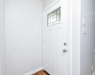 7406 Schiller Street - Photo Thumbnail 4