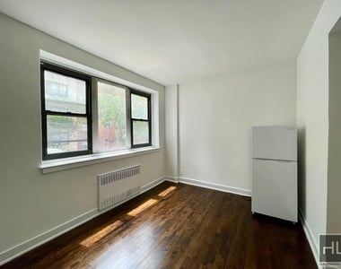 East 61 Street - Photo Thumbnail 1