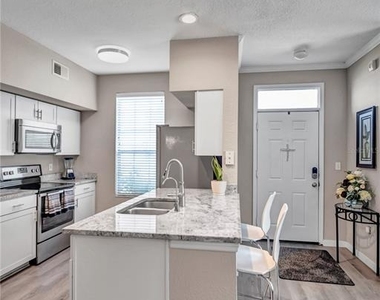 9834 Lake Chase Island Way - Photo Thumbnail 2