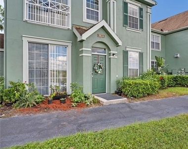 9834 Lake Chase Island Way - Photo Thumbnail 1