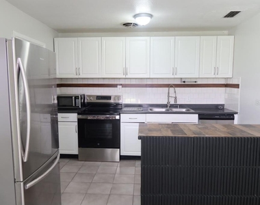 6731 Mopsy Ln - Photo Thumbnail 3