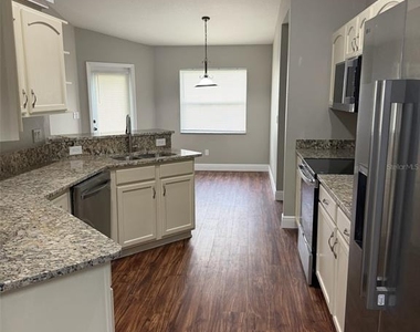 4836 Nw 45th Court - Photo Thumbnail 3
