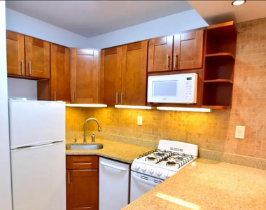 225 East 10th Street - Photo Thumbnail 3